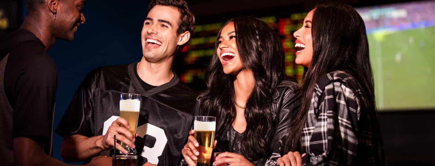 Group of people drinking beer at Public House