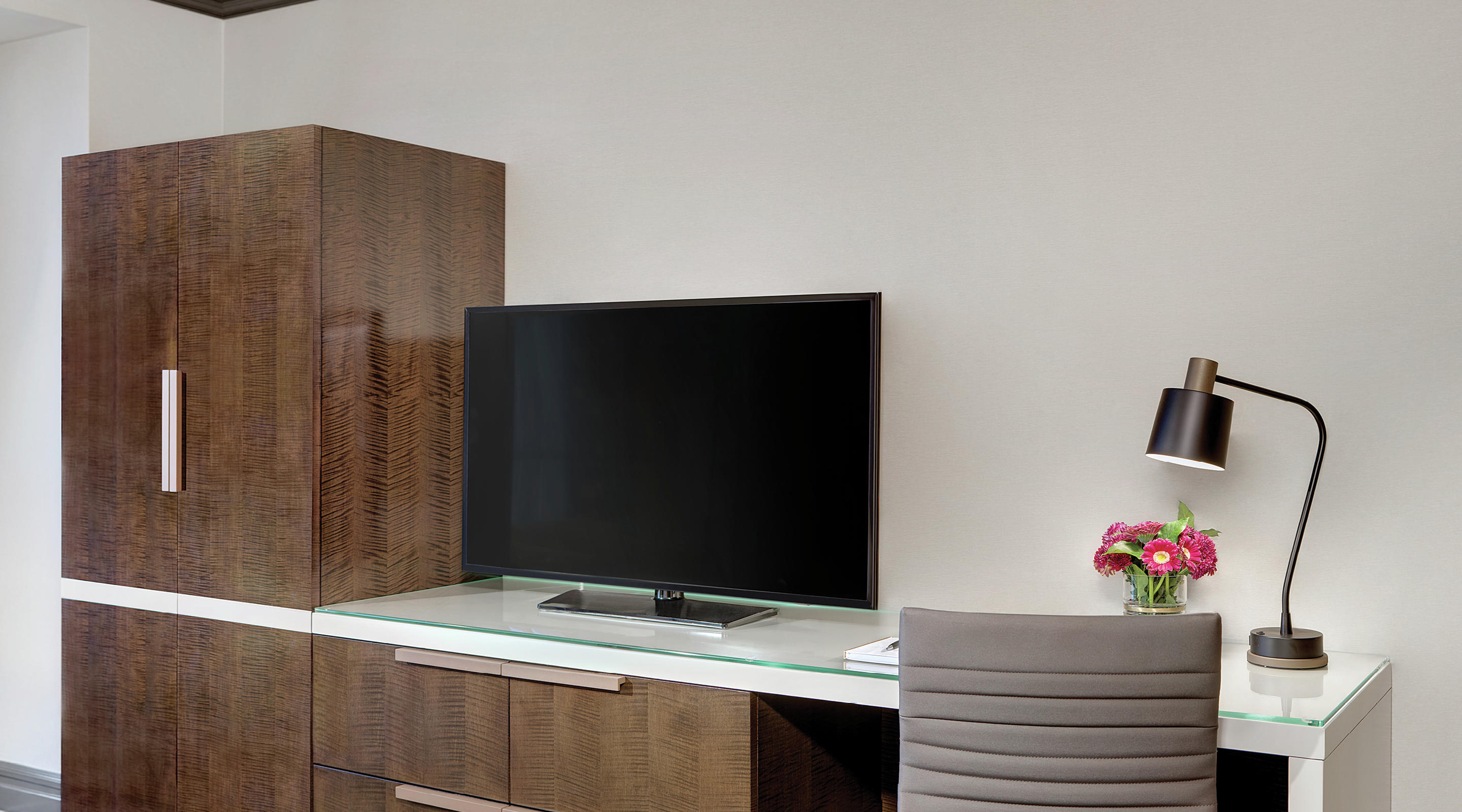 TV and desk work space of a Tower Premium King Room.